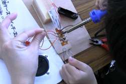 �������_��